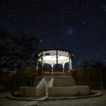 white and brown wooden gazebo during night time