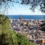 a view of a city from a hill