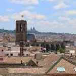 a view of a city with a clock tower