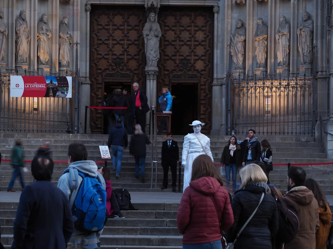 A group of people standing in front of a building