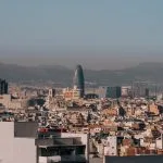 A view of a city with mountains in the background