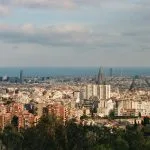 Panoramic cityscape with buildings and the ocean in background