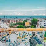 a view of a city from a tiled roof