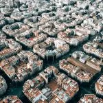 aerial photo of brown and white city buildings