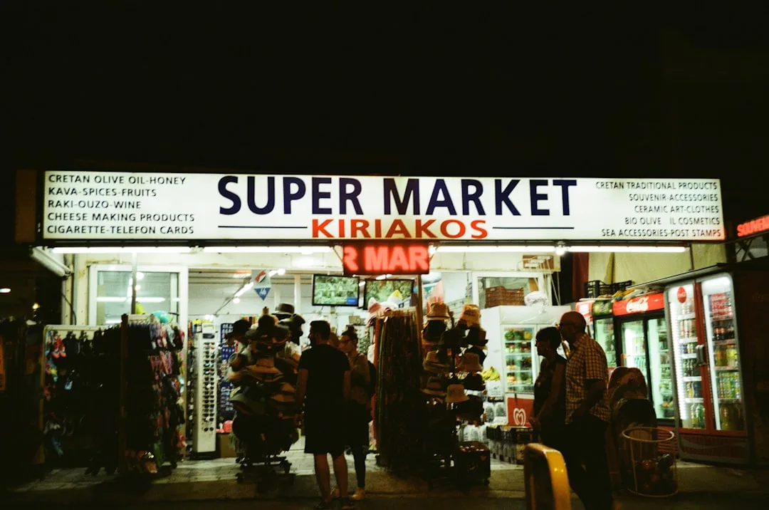 people walking on the street during night time