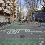 a city street with a bike lane painted on it