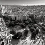 Panoramic view of a sprawling city with a park